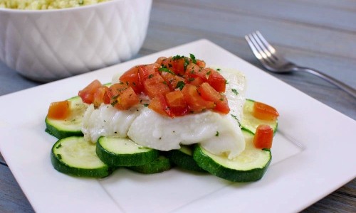 Cod Baked with Zucchini and Tomatoes