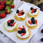 Cream Puff Pastries With Whipped Cream and Berries