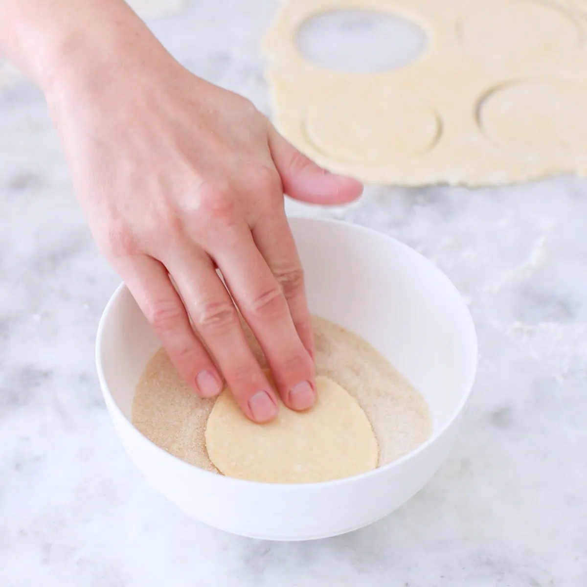 Farmer's cheese cookies - assembling, dipping in sugar. 