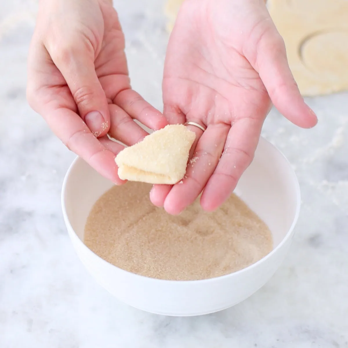 Farmer's cheese cookies - assembling, dipping in sugar. 