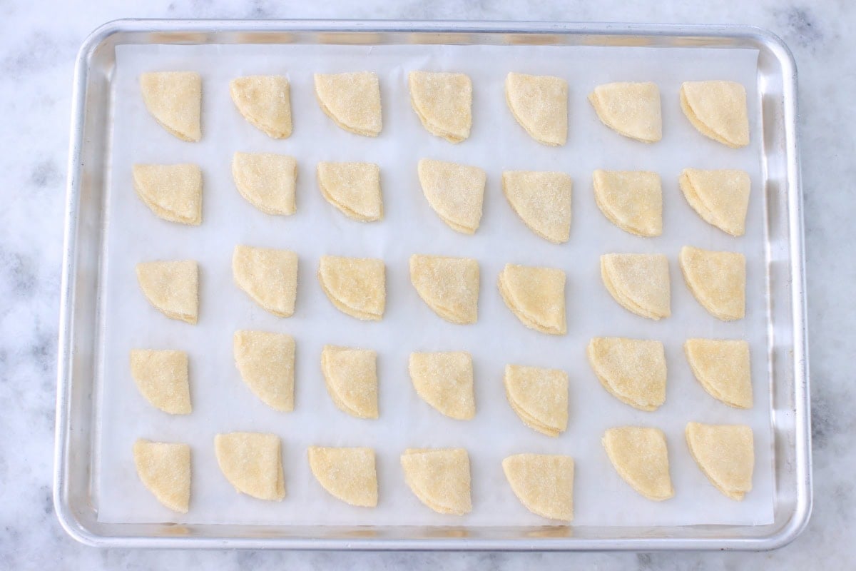 Farmer's cheese cookies on a baking sheet.