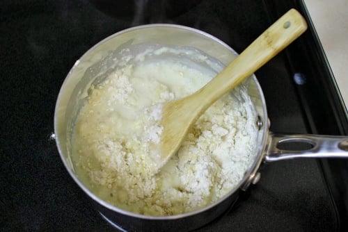 Mixing pate a choux dough on the stove