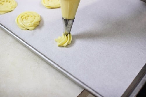 Piping out pate a choux dough (2)