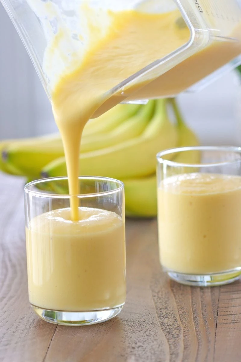 Mango Banana Smoothie made with yogurt, banana, mango, peaches and orange juice. 