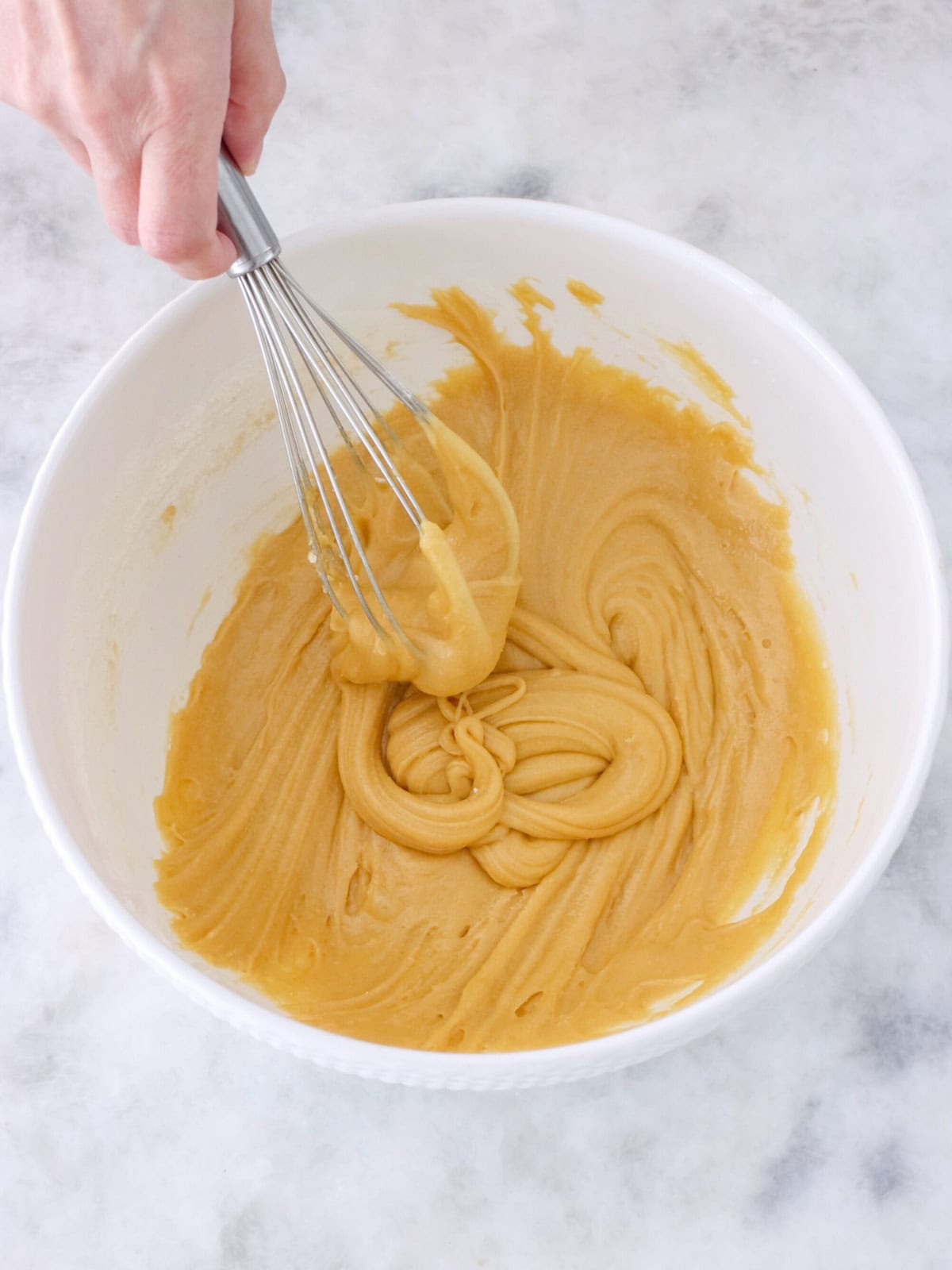 Cookie bar batter (blondies) in a bowl. 