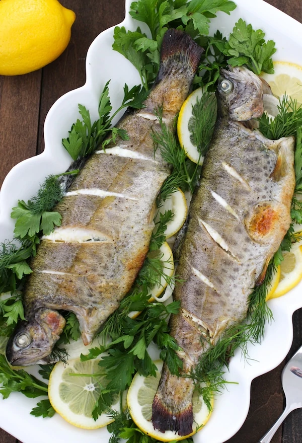 https://www.olgasflavorfactory.com/wp-content/uploads/2014/01/Roasted-Whole-Trout-With-Lemon-and-Herbs-1-2-copy.webp