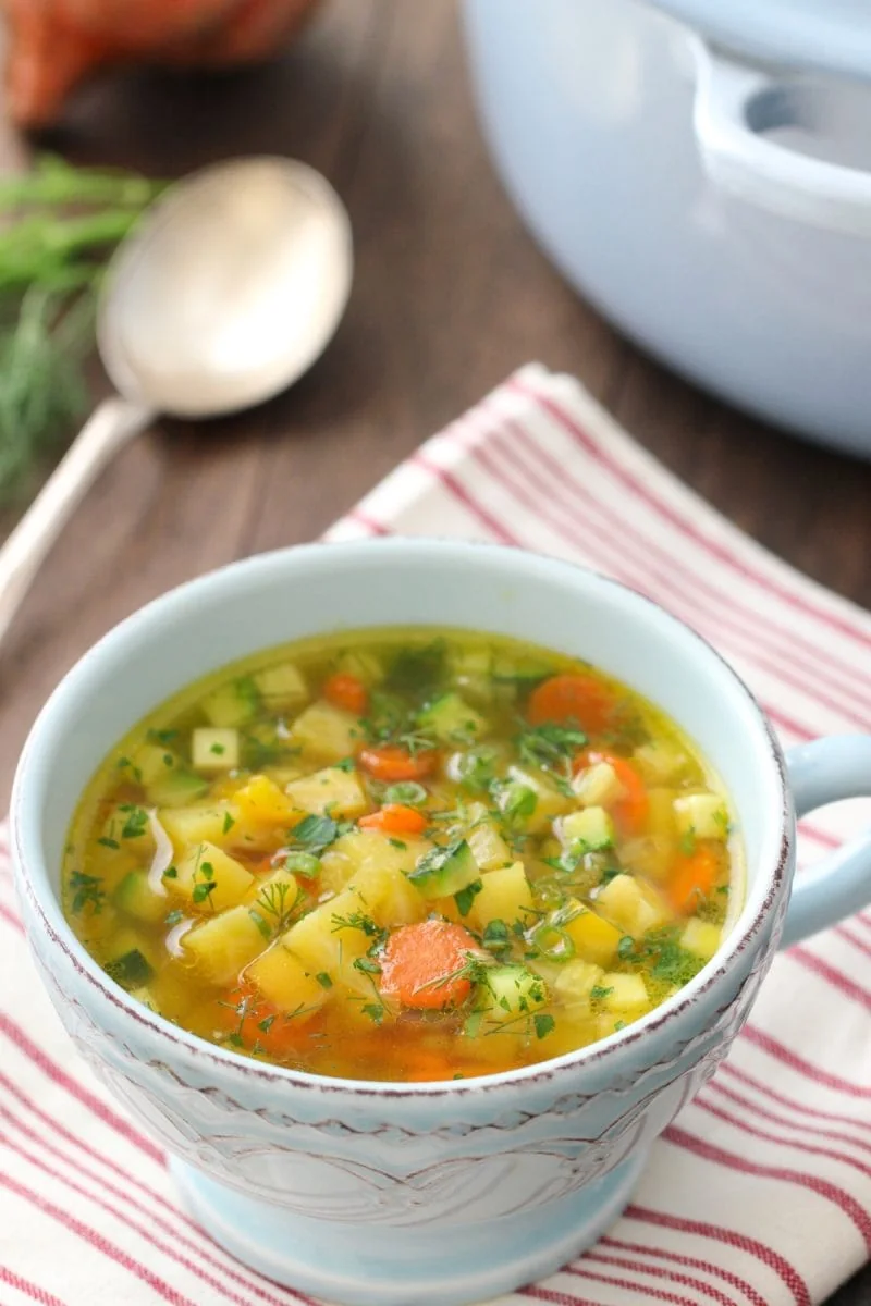 A bowl of golden beet soup