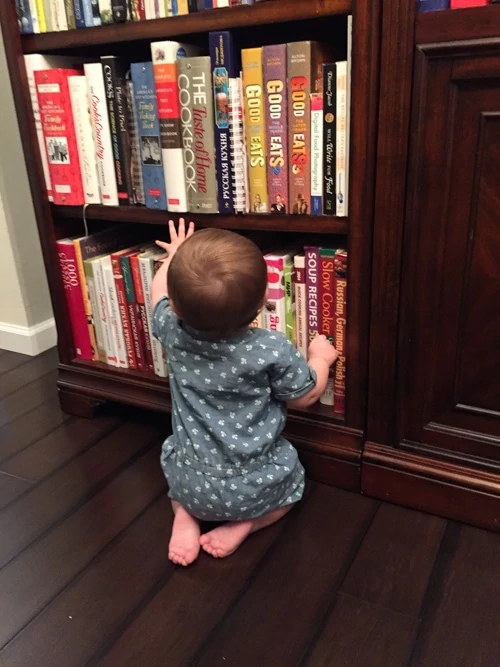 My cute niece Madeline, checking out some of my books:). 