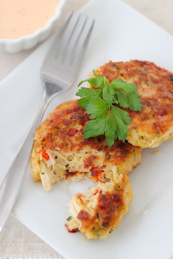 Crab Cakes with large chunks of crab served with a roasted red pepper sauce 