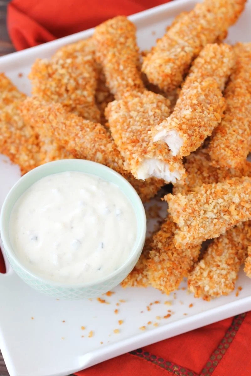 Homemade Fish Sticks With Creamy Tartar Sauce. The fish sticks are crisp and crunchy on the inside and juicy and flaky on the inside.