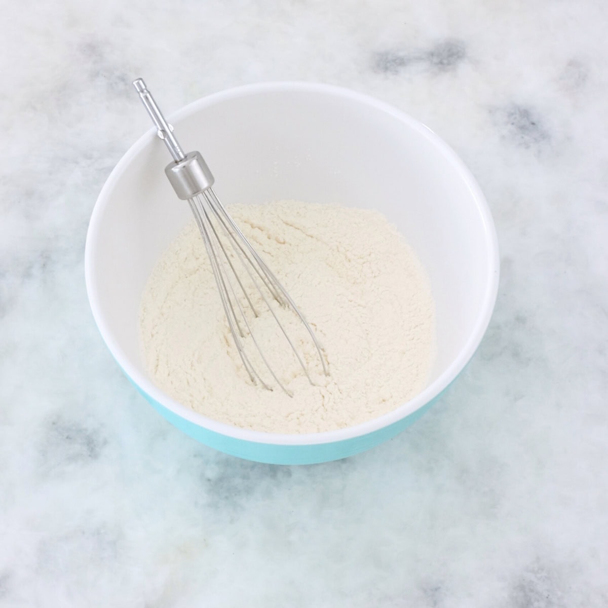 Banana upside down cake process, whisking the dry ingredients.
