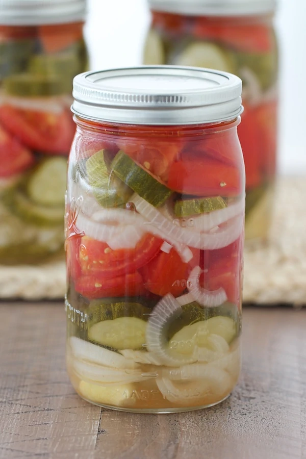 https://www.olgasflavorfactory.com/wp-content/uploads/2018/08/Marinated-Tomato-and-Cucumber-Salad-1-14-copy.webp