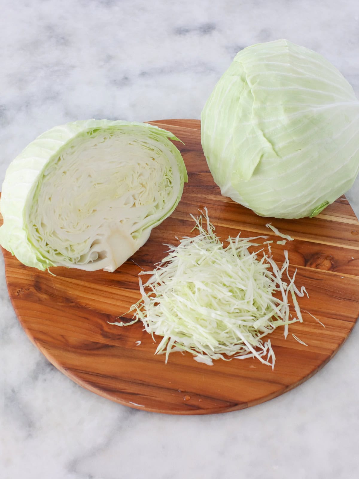 Shredding cabbage for homemade sauerkraut.