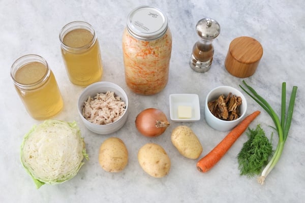 Ingredients for Shchi Russian Cabbage and Sauerkraut Soup with potatoes and dry mushrooms.