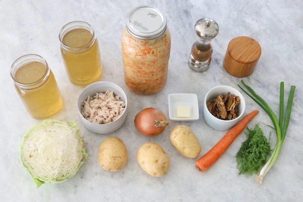 Ingredients for Shchi Russian Cabbage and Sauerkraut Soup with potatoes and dry mushrooms. 