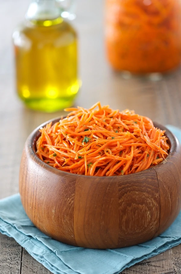 Russian Carrot Salad, also called Korean Carrots is a carrot salad flavored with onions, garlic and coriander. 
