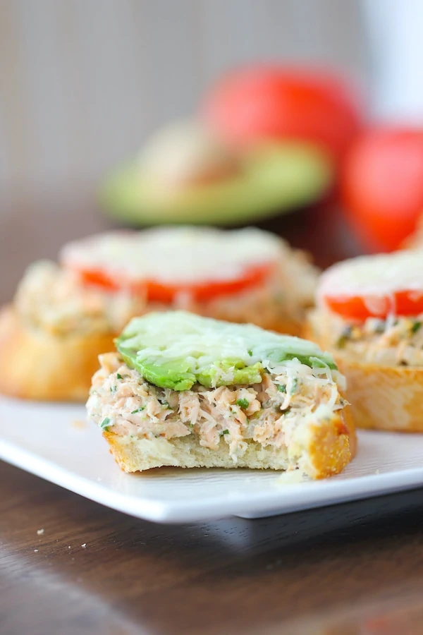 Salmon Melts - appetizer sandwiches with salmon, tomatoes, avocados and cheese