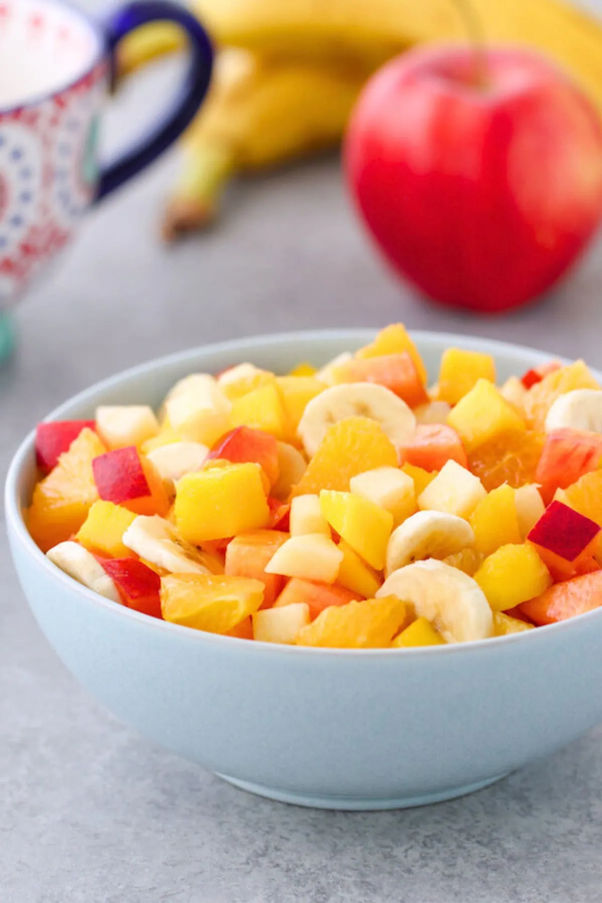 Make ahead fruit salad with tropical fruit in a bowl that stays fresh for days. 
