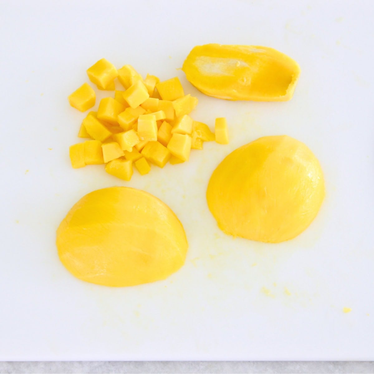 Chopping mango for fruit salad.