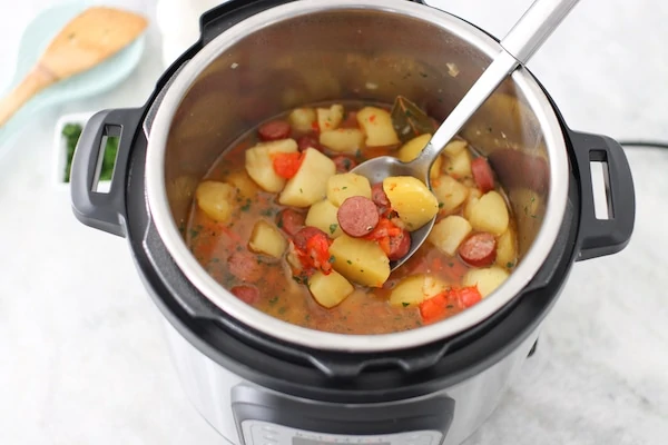 https://www.olgasflavorfactory.com/wp-content/uploads/2021/02/Instant-Pot-Potatoes-and-Sausage-Dinner-with-peppers-and-onions.webp