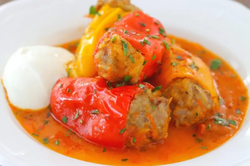 Stuffed mini peppers with sour cream and tomato sauce