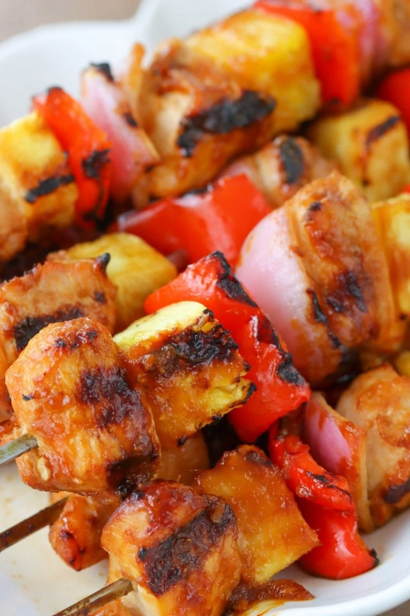 Grilled Teriyaki Chicken Kabobs with a homemade teriyaki sauce, with pineapple, bell peppers and red onion. 