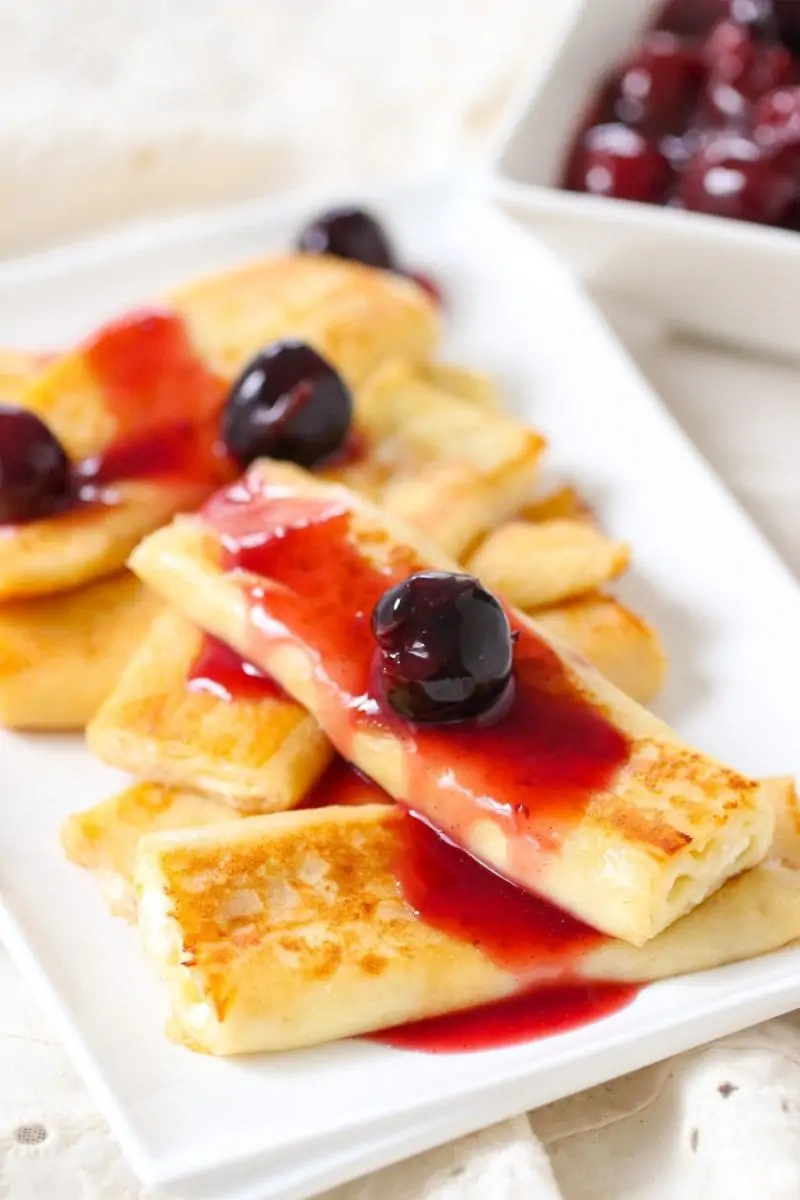 Cheese Blintzes with a cherry sauce