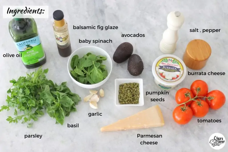 Ingredients for tomato Caprese with avocado, pesto and burrata cheese