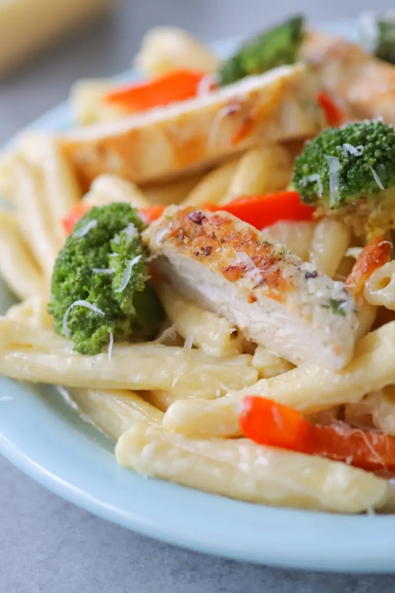 Chicken Alfredo Pasta with broccoli and bell peppers