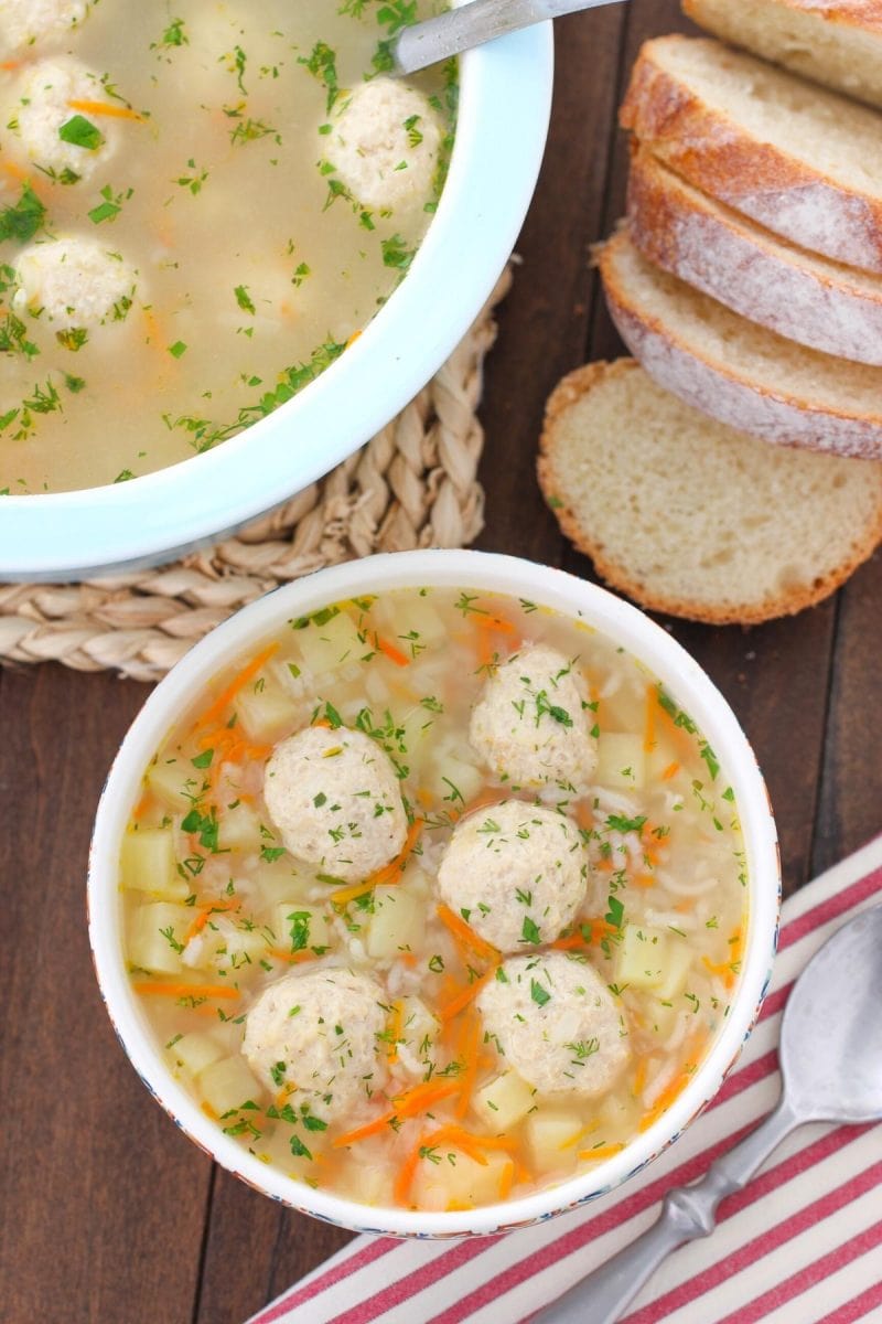 A bowl of Chicken Meatball Soup Russian Frikadelki Soup