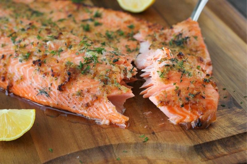 Baked steelhead trout with shallots, garlic, lemon and herbs. 