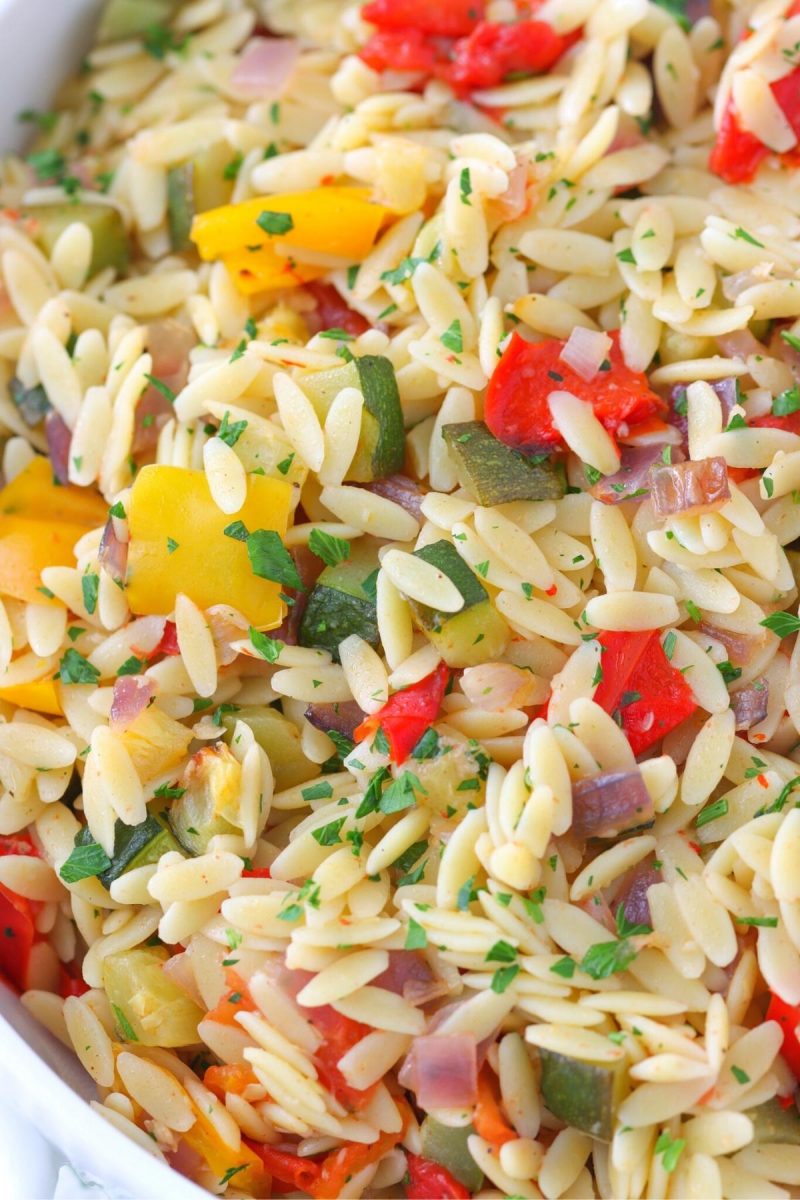 Orzo with roasted vegetables (zucchini, bell peppers, tomatoes, onion and fresh herbs)