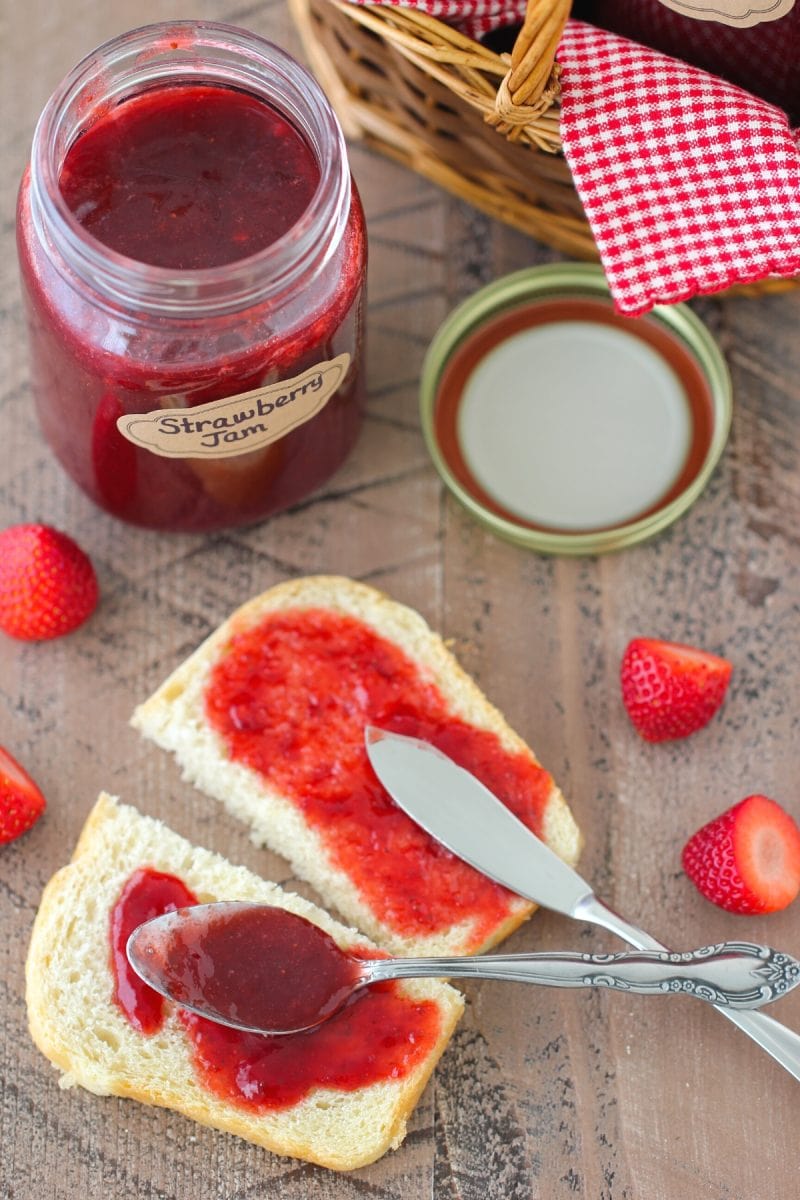 Homemade Strawberry Jam that's so easy to make. It's made with much less sugar than most other recipes and uses frozen strawberries. 