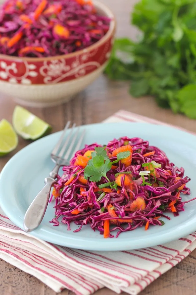 Tropical Purple Cabbage Slaw with mango, cilantro and carrot. 
