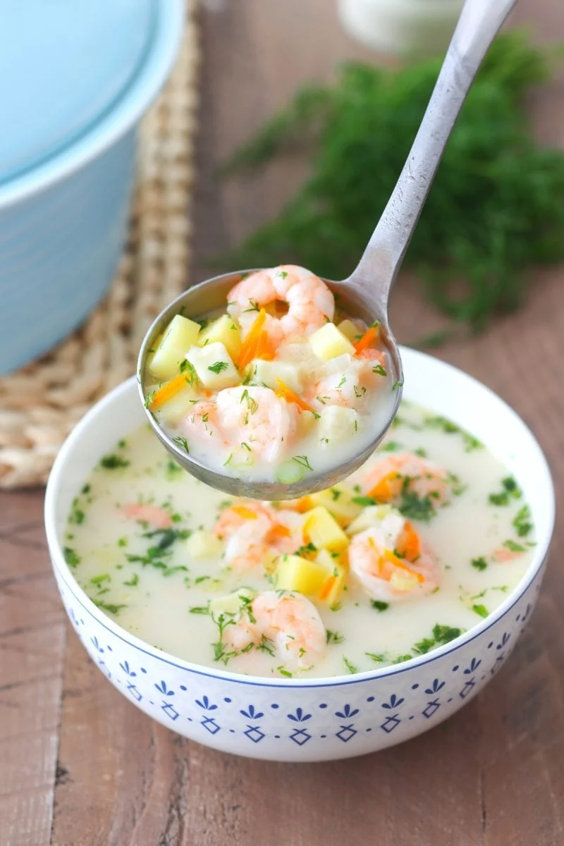 Creamy Shrimp Chowder
a ladle of soup going into a bowl