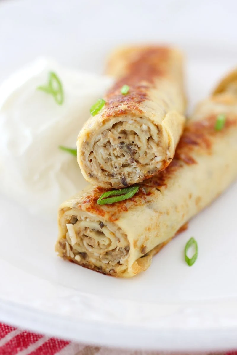 Savory crepes with chicken and mushroom filling
