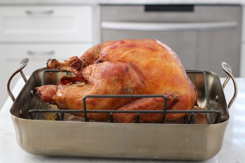 Roasted Brined turkey in a roasting pan