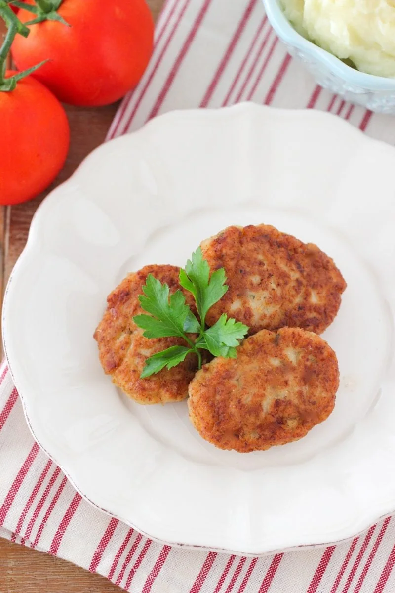 Chicken Kotleti (oval chicken meatballs)
Chicken patties on a plate. 