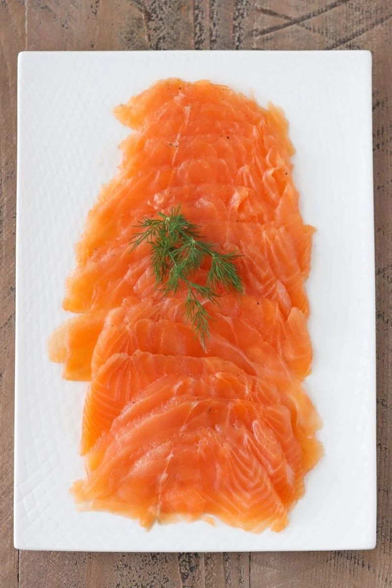 Salmon Gravlax thinly sliced - salt cured salmon with dill