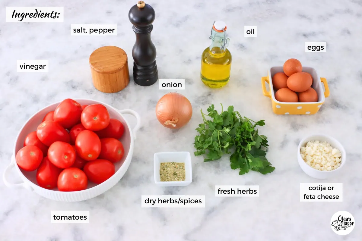 Ingredients for Shakshuka with Fresh Tomatoes on a marble counter. 